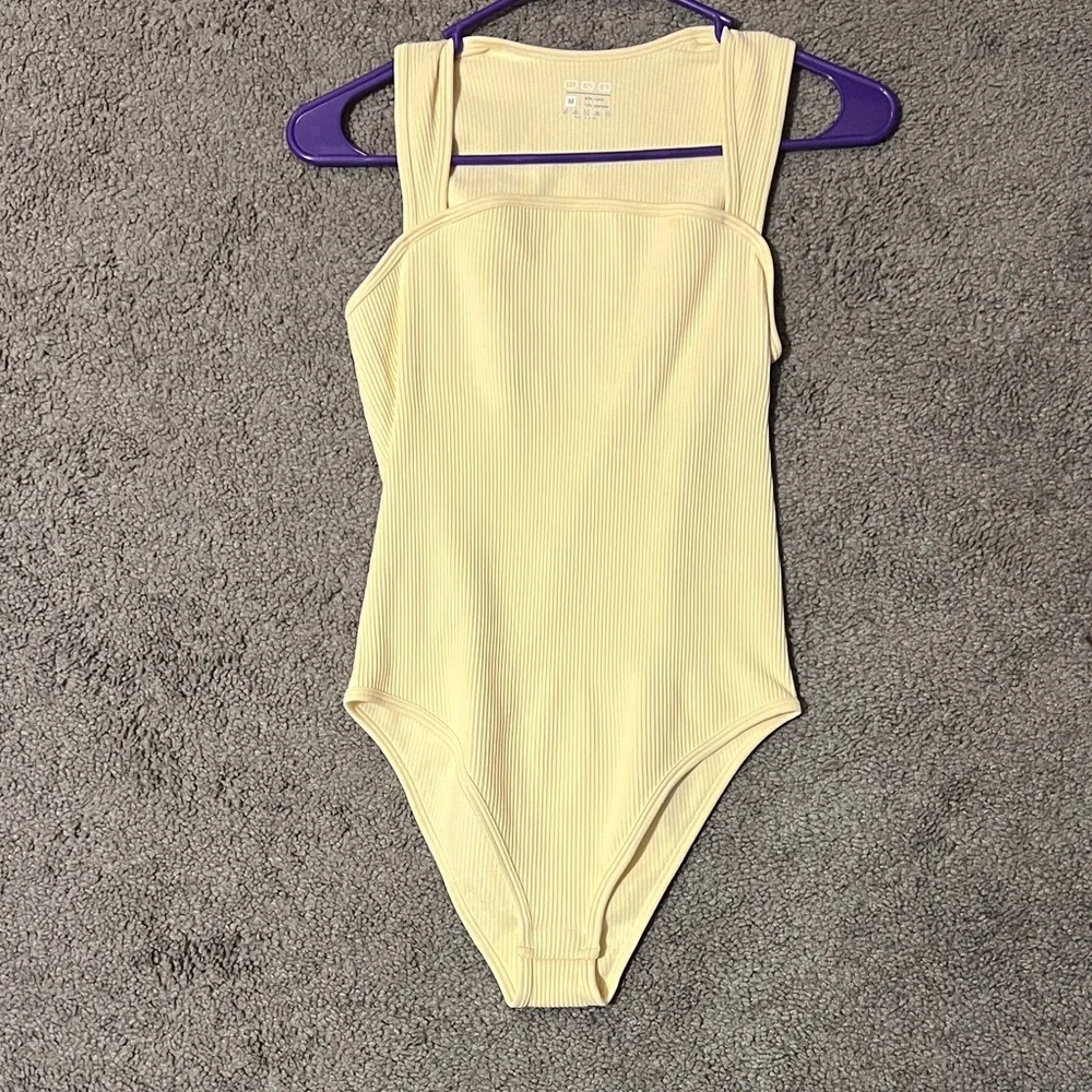 Chic Cream Ribbed Bodysuit - Picture 1 of 3